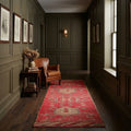 Red Persian runner rug in a corridor