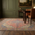 Pink Persian rug in a dining room