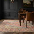 Pink Persian rug in a dining room