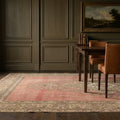 Pink Persian rug in a dining room