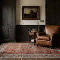 Red Persian rug in a styled room