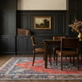 Red Persian rug in a dining room