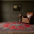 Red Persian rug in a styled room