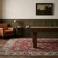Red Persian rug in a styled room