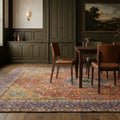 Red Persian rug in a dining room