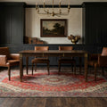 Red Persian rug in a dining room