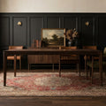 Red Persian rug in a dining room