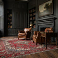 Red Persian rug in a library