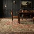 Red Persian rug in a dining room