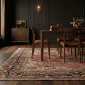 Red Persian rug in a dining room