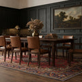 Red Persian rug in a dining room