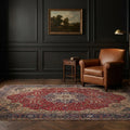 Red Persian rug in a styled room
