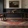 Red Persian rug in a dining room