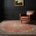 Red Persian rug in a styled room
