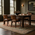 Red rug in a dining room