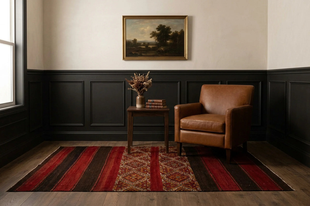 Red Turkish kilim rug in a den