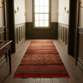 Red Turkish kilim rug in a dining room