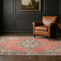 Red Turkish rug in a library