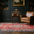 Red Turkish rug in a library