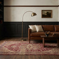 Red Turkish rug in a study