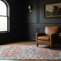 Red Turkish rug in a styled room