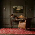 Red Turkish rug in a study