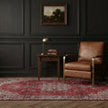 Red Turkish rug in a styled room