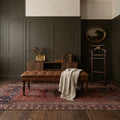 Red Turkish rug in a styled room