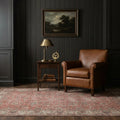 Red Turkish rug in a study
