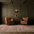 Red Turkish rug in a study