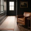 Terracotta Shaggy Wool runner rug in a landing