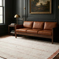 Terracotta Shaggy Wool area rug in a living room