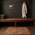 Orange Turkish doormat in a den