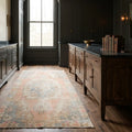 Orange Turkish rug in a styled room