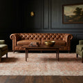 Orange Turkish rug in a styled room