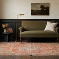 Orange Turkish rug in a library