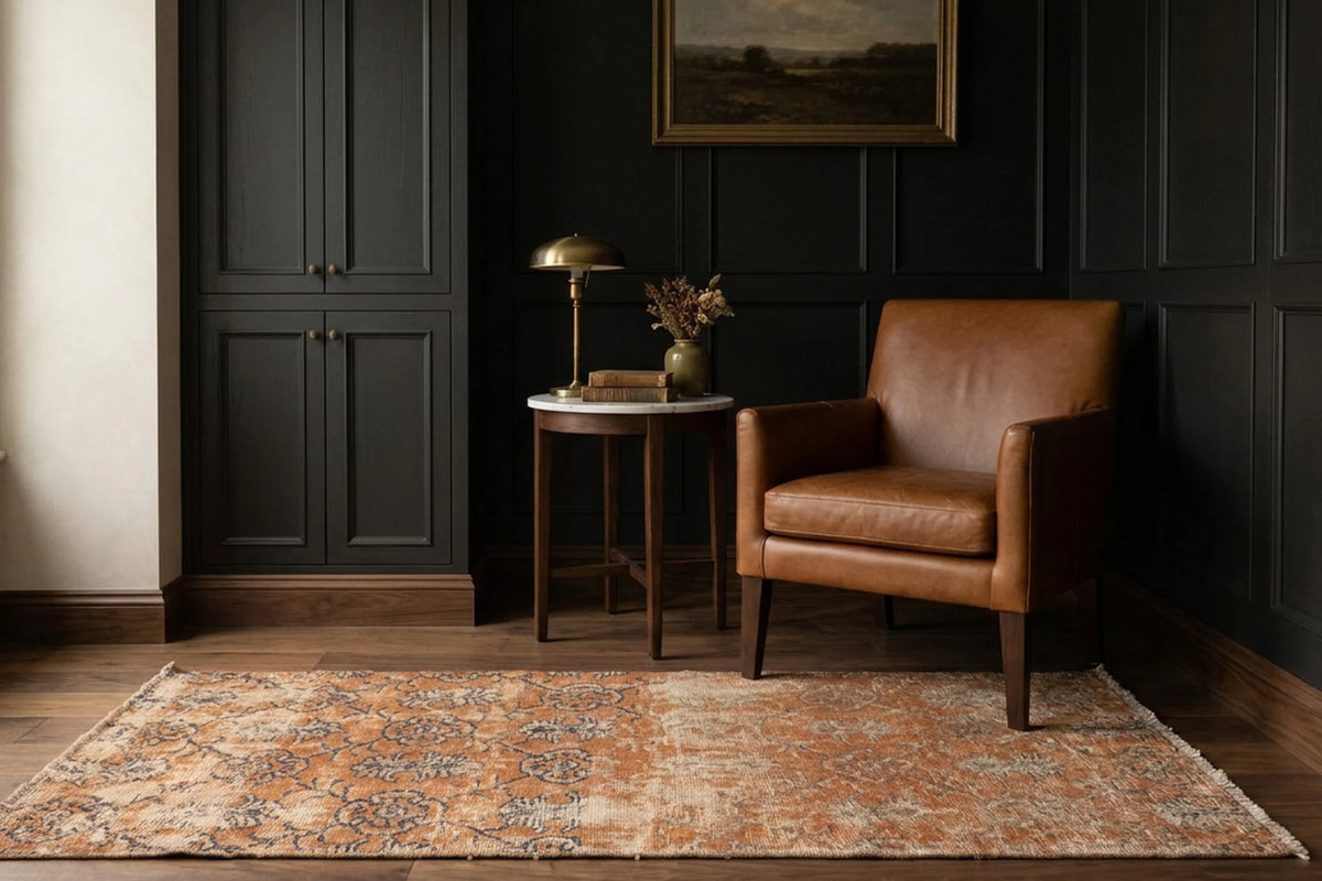 Orange Turkish rug in a bedroom