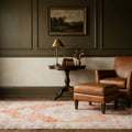 Orange Turkish rug in a styled room