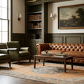 Orange Turkish rug in a library