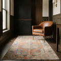 Orange Turkish rug in a den