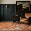 Orange Turkish rug in a styled room