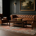 Orange Turkish rug in a styled room