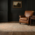 Orange Turkish rug in a study