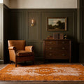 Orange Turkish rug in a styled room