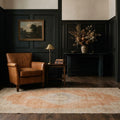 Orange Turkish rug in a styled room