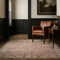 Orange Turkish rug in a corridor