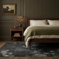 Orange Turkish rug in a bedroom