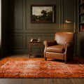 Orange Turkish rug in a styled room