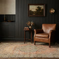 Orange Turkish rug in a styled room