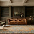 Orange Turkish rug in a styled room